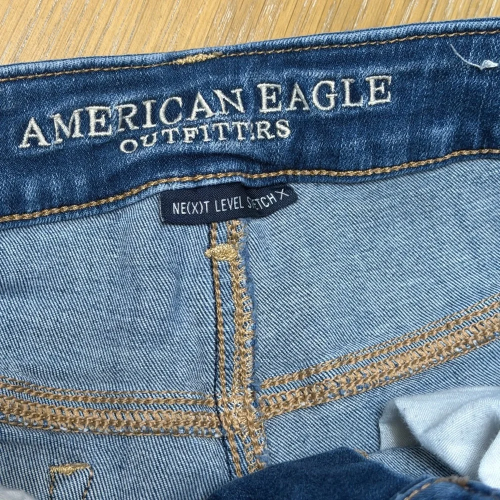 American Eagle Hi Rise Shortie Distressed Denim Shorts Size 10 Raw Hem